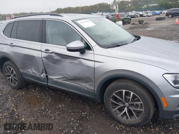 ✅ 2021 Volkswagen Tiguan SE • VIN: 3VV2B7AX8MM145802 • Lot: 43431599. Wystawiony na IAAI z przebiegiem 62 313 mil. Bezpłatny archiwum sprzedaży aukcyjnych z USA i szczegółowy raport historii pojazdu na DreamBid. Zdjęcie 6.