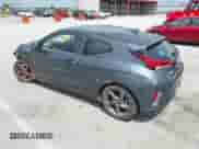 2019 Hyundai Veloster Premium z VIN KMHTG6AF2KU016593, wystawiony jako IAAI lot #42310151 z przebiegiem Nie podano mil oraz . Historia ofert i sprzedaży dostępna na DreamBid. Obrazek 3.