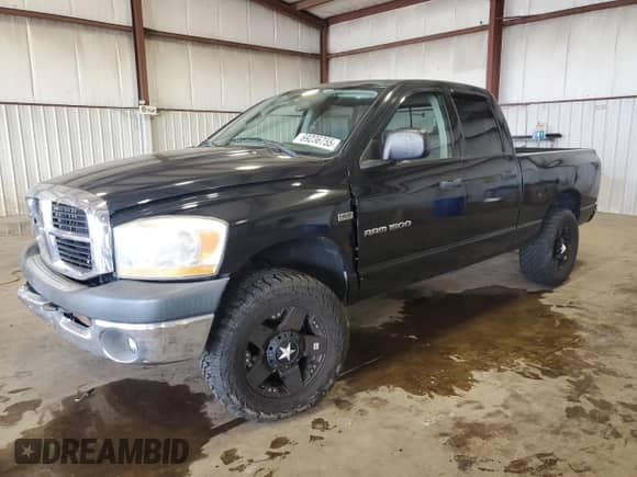 2006 Dodge 1500 Laramie z VIN 1D7HU18216S646119, wystawiony jako Copart lot #69236755 z przebiegiem 276 183 mil mil oraz Szkoda całkowita • Salvage title. Historia ofert i sprzedaży dostępna na DreamBid. Obrazek 1.