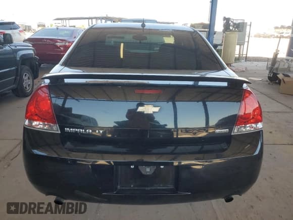 ✅ 2014 Chevrolet Impala LT • VIN: 2G1WB5E39E1121571 • Лот: 70295884. Опубликован ранее на Copart с пробегом 51 427 миль. Бесплатный доступ к архиву аукционных продаж из США и подробный отчёт об истории автомобиля на DreamBid. Изображение 6.