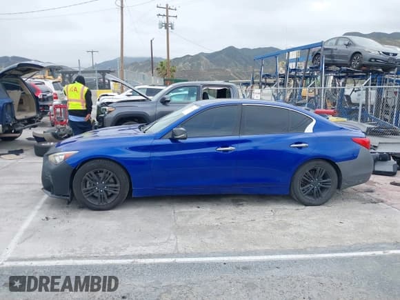 ✅ 2014 Infiniti Q50 • VIN: JN1BV7AP6EM689012 • Lot: 42063216. Listed on IAAI with 114,785 mi. Free auction sales archive from the USA and detailed vehicle history report at DreamBid. Image 14.
