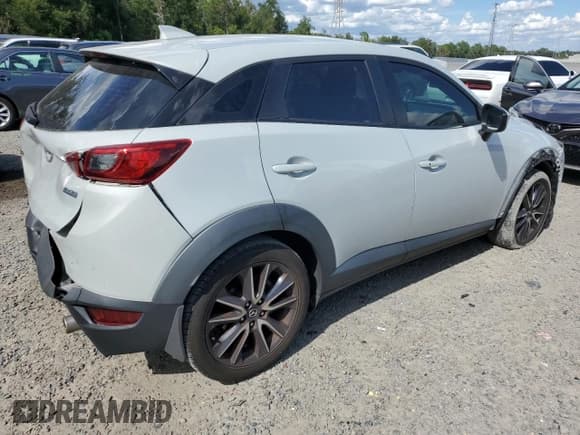 ✅ 2018 Mazda CX-3 Touring • VIN: JM1DKDC77J0305654 • Лот: 81857985. Опубликован ранее на Copart с пробегом 145 800 миль. Бесплатный доступ к архиву аукционных продаж из США и подробный отчёт об истории автомобиля на DreamBid. Изображение 3.