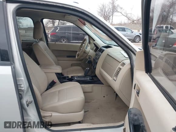 ✅ 2009 Ford Escape Limited • VIN: 1FMCU94G29KB47396 • Lot: 43651977. Listed on IAAI with 210,878 mi. Free auction sales archive from the USA and detailed vehicle history report at DreamBid. Image 5.