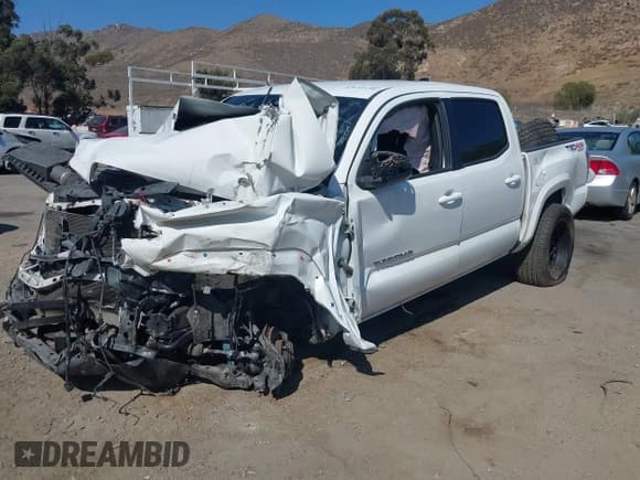 ✅ 2021 Toyota Tacoma SR • VIN: 3TMCZ5AN6MM432623 • Lot: 42652199. Listed on IAAI with Not provided. Free auction sales archive from the USA and detailed vehicle history report at DreamBid. Image 17.