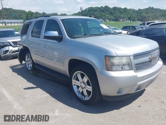 2011 Chevrolet Tahoe LTZ with VIN 1GNSKCE03BR368837, listed as a IAAI auction lot 42741642 with 166,196 mi miles and . Bid and sale history available at DreamBid. Image 1.