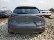 ✅ 2023 Mazda CX-30 Premium • VIN: 3MVDMBDY2PM579533 • Lot: 66742055. Wystawiony na Copart z przebiegiem Nie podano. Bezpłatny archiwum sprzedaży aukcyjnych z USA i szczegółowy raport historii pojazdu na DreamBid. Zdjęcie 6.