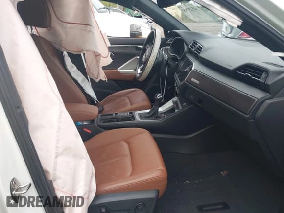 ✅ 2024 Audi Q3 Premium • VIN: WA1AUCF39R1100790 • Lot: 43239581. Listed on IAAI with 21,989 mi. Free auction sales archive from the USA and detailed vehicle history report at DreamBid. Image 5.