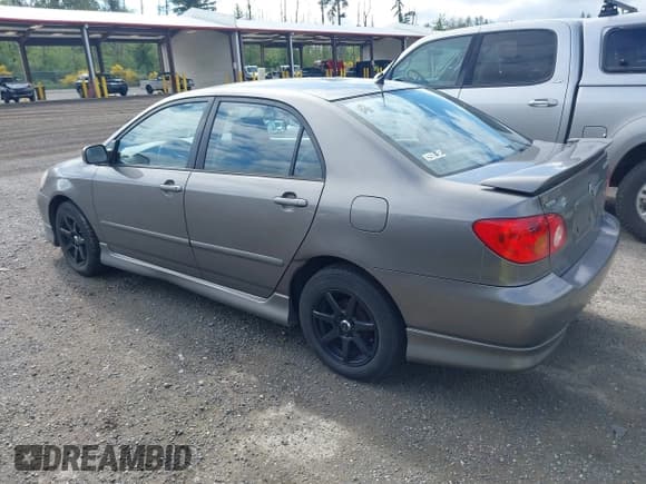 ✅ 2003 Toyota Corolla CE • VIN: 1NXBR32E13Z155285 • Lot: 42317077. Listed on IAAI with 221,971 mi. Free auction sales archive from the USA and detailed vehicle history report at DreamBid. Image 3.