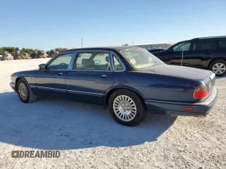 ✅ 1997 Jaguar XJ Vanden Plas • VIN: SAJKX6244VC801688 • Лот: 80841864. Опубликован ранее на Copart с пробегом Не указан. Бесплатный доступ к архиву аукционных продаж из США и подробный отчёт об истории автомобиля на DreamBid. Изображение 2.