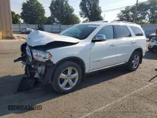 ✅ 2013 Dodge Durango Citadel • VIN: 1C4RDJEG2DC668037 • Lot: 69029655. Listed on Copart with 137,501 mi. Free auction sales archive from the USA and detailed vehicle history report at DreamBid. Image 1.