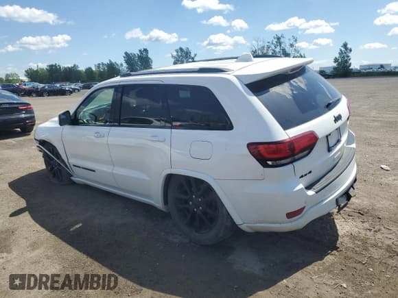 ✅ 2021 Jeep Grand Cherokee Laredo X • VIN: 1C4RJFAG0MC616918 • Lot: 64276495. Listed on Copart with 104,639 mi. Free auction sales archive from the USA and detailed vehicle history report at DreamBid. Image 2.