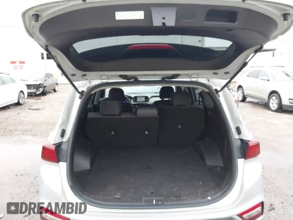 2019 Hyundai Santa Fe SEL Plus z VIN 5NMS33AD3KH130800, wystawiony jako IAAI lot #42666362 z przebiegiem 102 952 mil mil oraz . Historia ofert i sprzedaży dostępna na DreamBid. Obrazek 17.