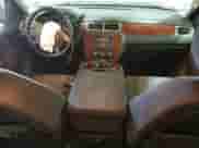 2013 Chevrolet Suburban LS с VIN 1GNSKHE72DR266801, выставлен на аукционе Copart как лот 71655405 с пробегом 214 077 миль миль и Списание • Salvage title. История ставок и продаж доступна на DreamBid. Изображение 8.