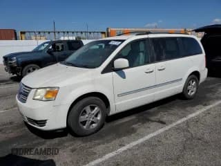 ✅ 2009 Dodge Grand Caravan SXT • VIN: 2D8HN54109R560979 • Lot: 84282155. Listed on Copart with 106,681 mi. Free auction sales archive from the USA and detailed vehicle history report at DreamBid. Image 1.