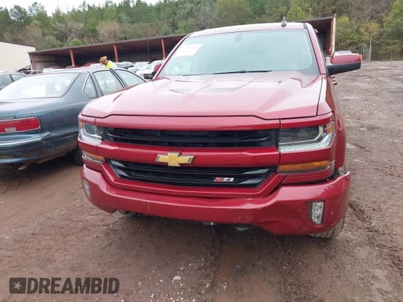 2018 Chevrolet Silverado 1500 LT z VIN 1GCVKREC6JZ176877, wystawiony jako IAAI lot #43559571 z przebiegiem Nie podano mil oraz . Historia ofert i sprzedaży dostępna na DreamBid. Obrazek 6.