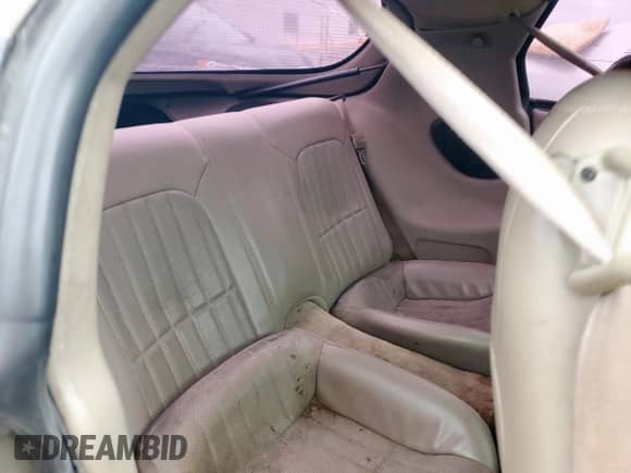 2002 Chevrolet Camaro z VIN 2G1FP22K422114559, wystawiony jako Copart lot #51294095 z przebiegiem 170 273 mil mil oraz Czysty tytuł • Clean title. Historia ofert i sprzedaży dostępna na DreamBid. Obrazek 10.