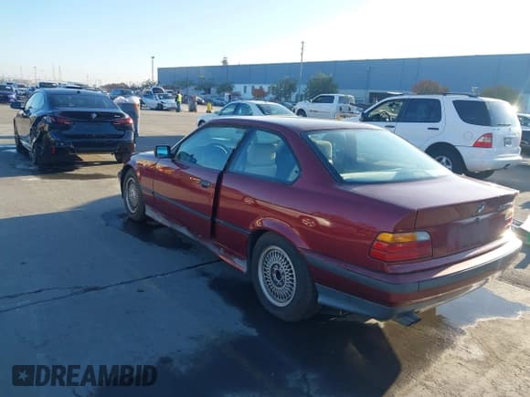 ✅ 1994 BMW 3 Series • VIN: WBABF3321REF44125 • Lot: 43927897. Listed on IAAI with 215,005 mi. Free auction sales archive from the USA and detailed vehicle history report at DreamBid. Image 3.