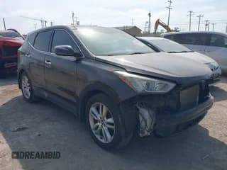 ✅ 2013 Hyundai Santa Fe Sport • VIN: 5XYZW3LA7DG007989 • Lot: 42219965. Listed on IAAI with 131,411 mi. Free auction sales archive from the USA and detailed vehicle history report at DreamBid. Image 1.