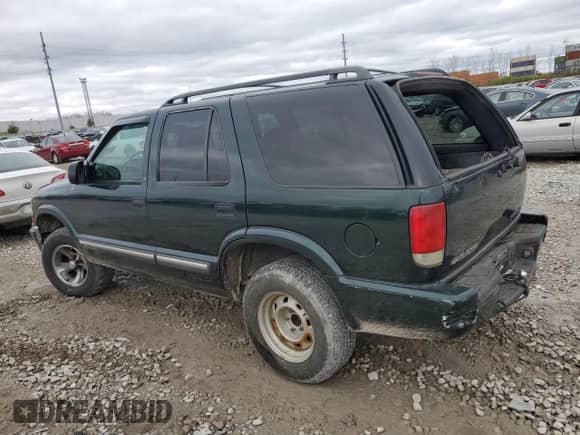 2001 Chevrolet Blazer LS с VIN 1GNCS13W91K254624, выставлен на аукционе Copart как лот 80281444 с пробегом 189 843 миль миль и Списание • Salvage title. История ставок и продаж доступна на DreamBid. Изображение 2.