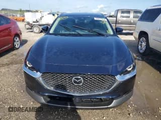 ✅ 2023 Mazda CX-30 S Select • VIN: 3MVDMBBMXPM574757 • Lot: 59947054. Wystawiony na Copart z przebiegiem Nie podano. Bezpłatny archiwum sprzedaży aukcyjnych z USA i szczegółowy raport historii pojazdu na DreamBid. Zdjęcie 5.