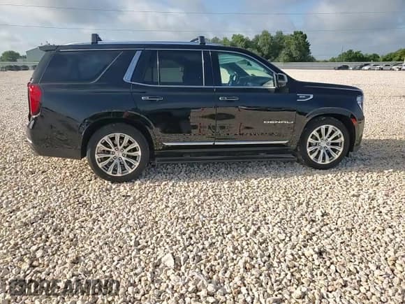 ✅ 2022 GMC Yukon Denali • VIN: 1GKS2DKL0NR256891 • Лот: 61305115. Опубликован ранее на Copart с пробегом 61 885 миль. Бесплатный доступ к архиву аукционных продаж из США и подробный отчёт об истории автомобиля на DreamBid. Изображение 13.