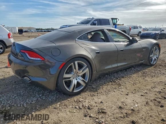 ✅ 2012 Fisker Karma EcoChic • VIN: YH4K16AA6CA001447 • Lot: 94336845. Listed on Copart with Not provided. Free auction sales archive from the USA and detailed vehicle history report at DreamBid. Image 3.