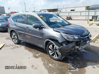 ✅ 2015 Honda CR-V Touring • VIN: 5J6RM3H90FL018709 • Lot: 43439533. Listed on IAAI with 120,994 mi. Free auction sales archive from the USA and detailed vehicle history report at DreamBid. Image 1.
