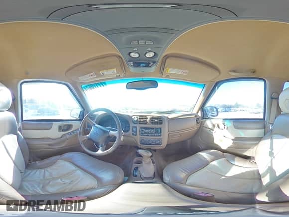 2000 Chevrolet Blazer LT with VIN 1GNDT13WXY2236550, listed as a Copart auction lot 77170574 with 221,994 mi miles and Salvage title. Bid and sale history available at DreamBid. Image 14.