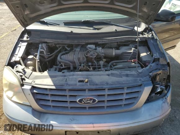 ✅ 2004 Ford Freestar SES • VIN: 2FMZA57694BB12355 • Лот: 73170984. Опубликован ранее на Copart с пробегом 159 158 миль. Бесплатный доступ к архиву аукционных продаж из США и подробный отчёт об истории автомобиля на DreamBid. Изображение 12.