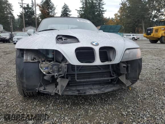 1997 BMW 3 Series Z3 1.9 with VIN 4USCH7325VLB80686, listed as a Copart auction lot 90709565 with 127,908 mi miles and Salvage title. Bid and sale history available at DreamBid. Image 5.