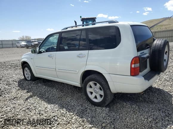 ✅ 2003 Suzuki XL7 Touring • VIN: JS3TX92V034109417 • Lot: 52672475. Listed on Copart with 96,760 mi. Free auction sales archive from the USA and detailed vehicle history report at DreamBid. Image 2.