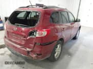 ✅ 2012 Hyundai Santa Fe GLS • VIN: 5XYZGDAG4CG135583 • Lot: 41305409. Listed on IAAI with 155,944 mi. Free auction sales archive from the USA and detailed vehicle history report at DreamBid. Image 4.