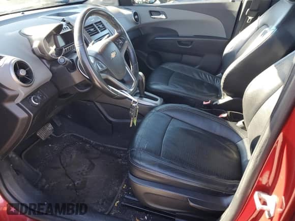 2012 Chevrolet Sonic LTZ with VIN 1G1JE5SHXC4126894, listed as a Copart auction lot 45186475 with 76,461 mi miles and Clean title. Bid and sale history available at DreamBid. Image 7.