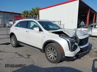 ✅ 2021 Cadillac XT4 FWD Premium Luxury • VIN: 1GYFZCR4XMF080010 • Лот: 42098802. Опубликован ранее на IAAI с пробегом 34 402 миль. Бесплатный доступ к архиву аукционных продаж из США и подробный отчёт об истории автомобиля на DreamBid. Изображение 1.