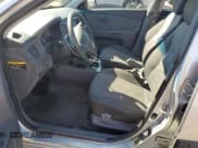 ✅ 2009 Kia Rio LX • VIN: KNADE243896542523 • Lot: 70467655. Listed on Copart with 121,444 mi. Free auction sales archive from the USA and detailed vehicle history report at DreamBid. Image 7.