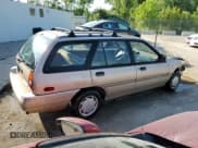 ✅ 1993 Ford Escort LX • VIN: 1FAPP15J5PW333034 • Lot: 56704265. Listed on Copart with 86,691 mi. Free auction sales archive from the USA and detailed vehicle history report at DreamBid. Image 3.