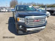 ✅ 2015 GMC Canyon 4WD SLT • VIN: 1GTG6CE39F1183550 • Lot: 41791963. Listed on IAAI with 148,212 mi. Free auction sales archive from the USA and detailed vehicle history report at DreamBid. Image 1.
