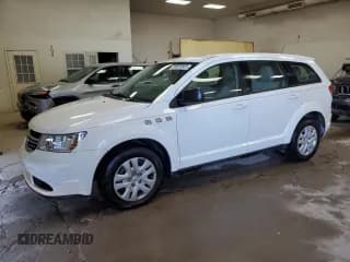 ✅ 2014 Dodge Journey American Value • VIN: 3C4PDCABXET103750 • Lot: 89838865. Listed on Copart with 49,050 mi. Free auction sales archive from the USA and detailed vehicle history report at DreamBid. Image 1.