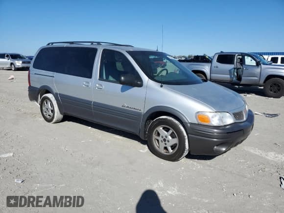 ✅ 2002 Pontiac Montana 1SX • VIN: 1GMDV03E72D193880 • Lot: 42328975. Wystawiony na Copart z przebiegiem 86 980 mil. Bezpłatny archiwum sprzedaży aukcyjnych z USA i szczegółowy raport historii pojazdu na DreamBid. Zdjęcie 4.