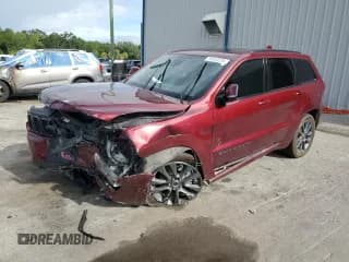 ✅ 2018 Jeep Grand Cherokee High Altitude • VIN: 1C4RJFCG2JC446070 • Lot: 69920235. Listed on Copart with 104,015 mi. Free auction sales archive from the USA and detailed vehicle history report at DreamBid. Image 1.