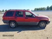 ✅ 2002 Jeep Grand Cherokee Laredo • VIN: 1J4GX48S62C257425 • Lot: 43435617. Listed on IAAI with 251,435 mi. Free auction sales archive from the USA and detailed vehicle history report at DreamBid. Image 13.