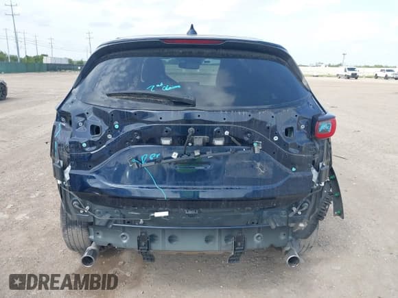 ✅ 2023 Mazda CX-5 S Carbon Edition • VIN: JM3KFBCM6P0165036 • Lot: 42622732. Listed on IAAI with 44,497 mi. Free auction sales archive from the USA and detailed vehicle history report at DreamBid. Image 17.