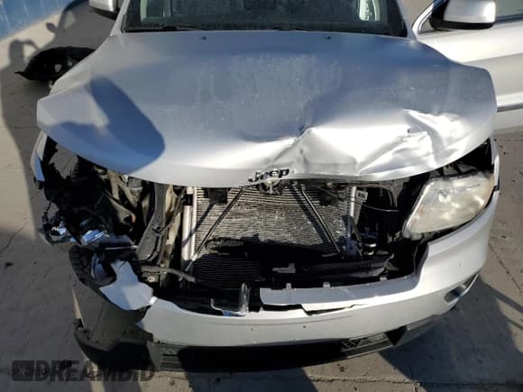 ✅ 2012 Jeep Grand Cherokee Laredo • VIN: 1C4RJFAG3CC107825 • Лот: 85431365. Опубликован ранее на Copart с пробегом 208 886 миль. Бесплатный доступ к архиву аукционных продаж из США и подробный отчёт об истории автомобиля на DreamBid. Изображение 12.