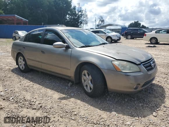 ✅ 2002 Nissan Altima S • VIN: 1N4AL11D52C197743 • Lot: 69220935. Listed on Copart with 206,789 mi. Free auction sales archive from the USA and detailed vehicle history report at DreamBid. Image 4.