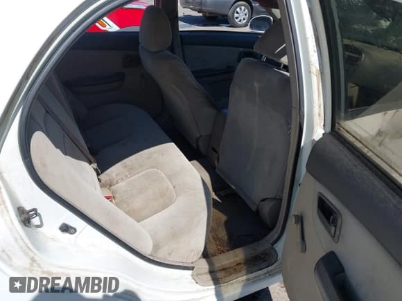 ✅ 2005 Kia Spectra LX • VIN: KNAFE122955121133 • Лот: 42434111. Опубликован ранее на IAAI с пробегом 184 114 миль. Бесплатный доступ к архиву аукционных продаж из США и подробный отчёт об истории автомобиля на DreamBid. Изображение 8.