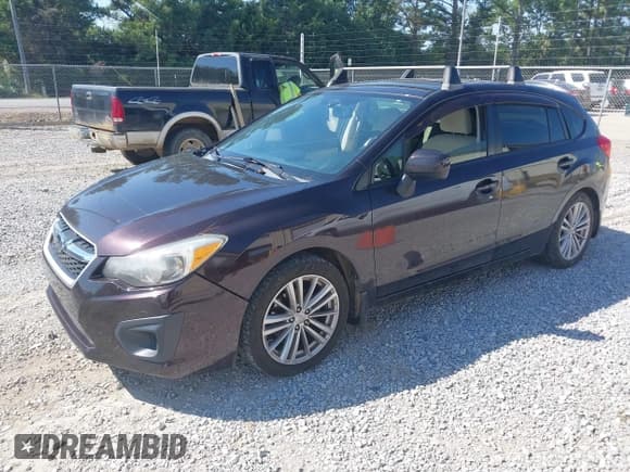 ✅ 2013 Subaru Impreza Premium • VIN: JF1GPAE63DH208318 • Lot: 43375383. Listed on IAAI with 127,651 mi. Free auction sales archive from the USA and detailed vehicle history report at DreamBid. Image 2.