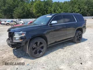 2020 Chevrolet Tahoe Premier z VIN 1GNSKCKCXLR105115, wystawiony jako Copart lot #69403385 z przebiegiem 108 319 mil mil oraz Szkoda całkowita • Salvage title. Historia ofert i sprzedaży dostępna na DreamBid. Obrazek 1.