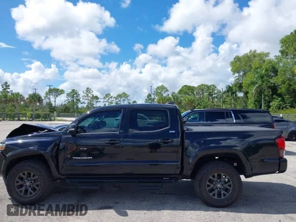2022 Toyota Tacoma SR5 with VIN 3TMAZ5CN4NM164094, listed as a IAAI auction lot 43409274 with 38,585 mi miles and . Bid and sale history available at DreamBid. Image 14.