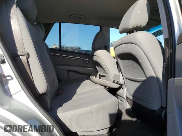 2011 Hyundai Santa Fe GLS с VIN 5XYZG3AB5BG035831, выставлен на аукционе Copart как лот 76668144 с пробегом 147 729 миль миль и Списание • Salvage title. История ставок и продаж доступна на DreamBid. Изображение 11.