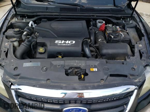 ✅ 2012 Ford Taurus SHO • VIN: 1FAHP2KT5CG100467 • Лот: 64783925. Опубликован ранее на Copart с пробегом 165 515 миль. Бесплатный доступ к архиву аукционных продаж из США и подробный отчёт об истории автомобиля на DreamBid. Изображение 11.